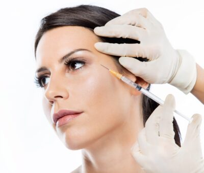 beautiful-young-woman-getting-botox-cosmetic-injection-her-face-min beautiful-young-woman-getting-botox-cosmetic-injection-her-face-min